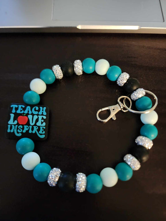 Teach Love Inspire Wristlet