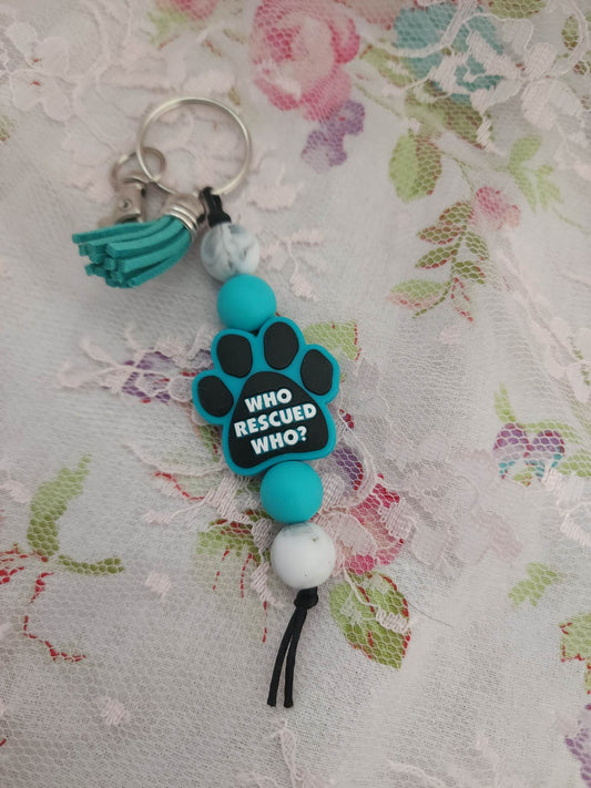 Teal Who rescued who Paw Beaded Keychain